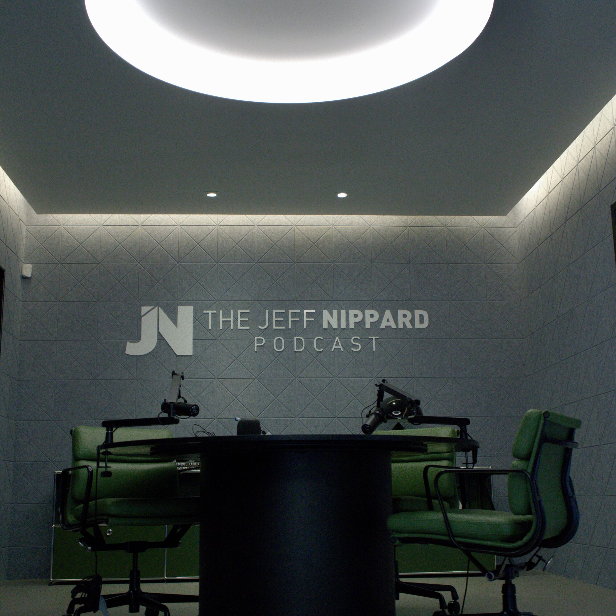 The Jeff Nippard podcast set under a recessed ceiling halo