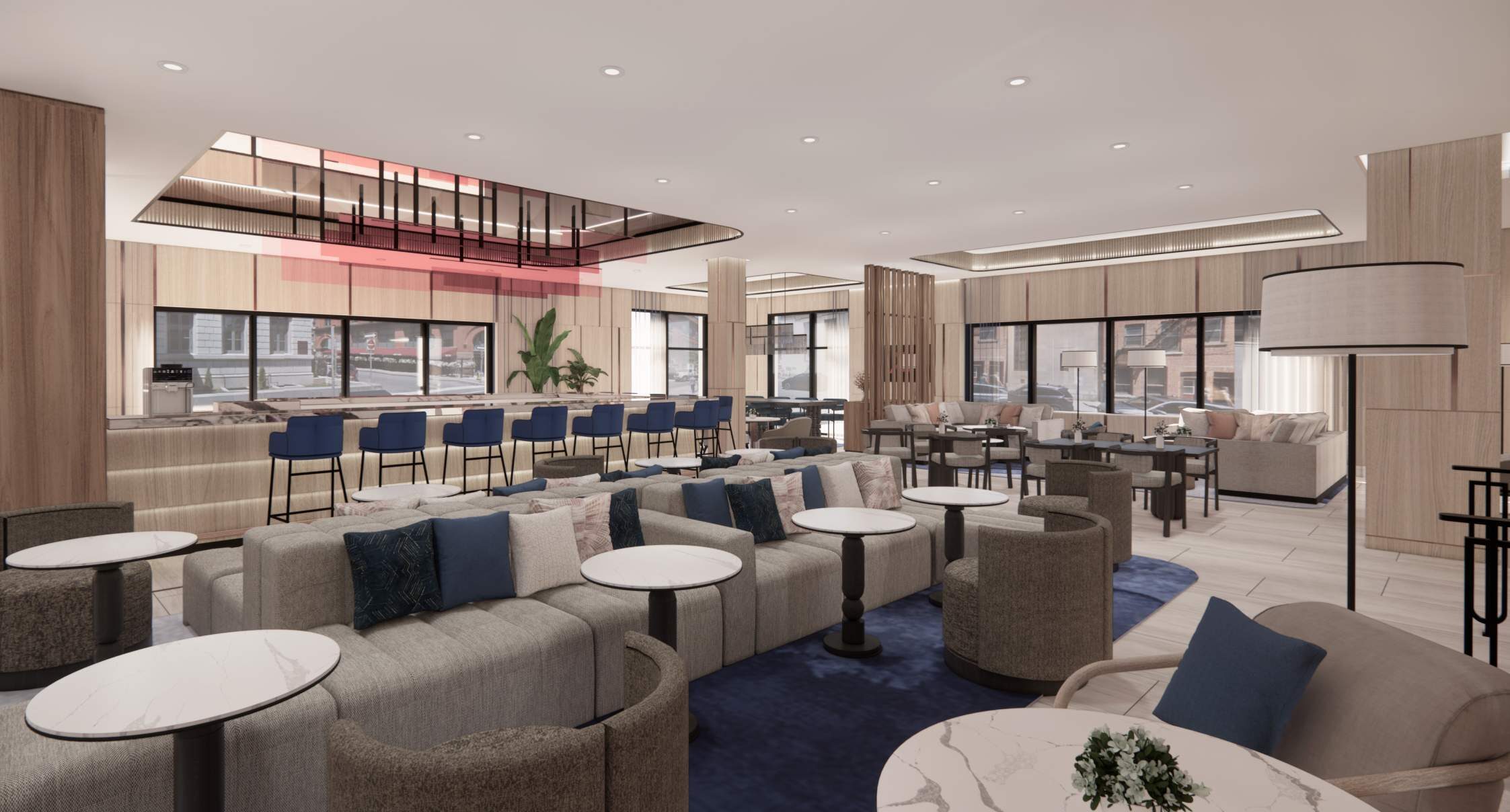 The great room and bar at Riott, under feature pendants
