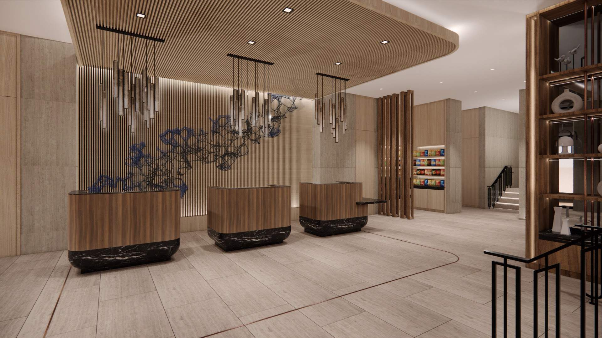The welcome lobby, with sculptural glass pendant clusters over the reception desks
