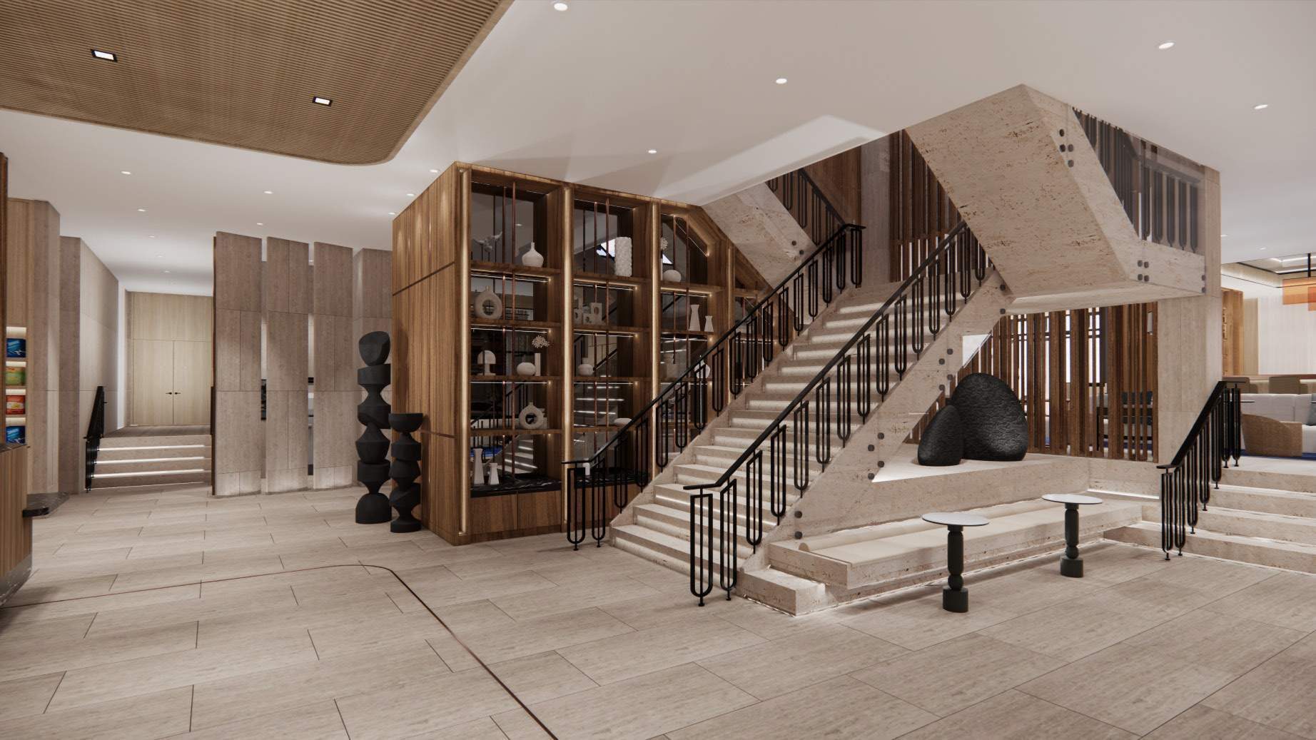 The lobby stair beside a lit display wall