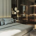 A bedroom with a large bed and glass walls