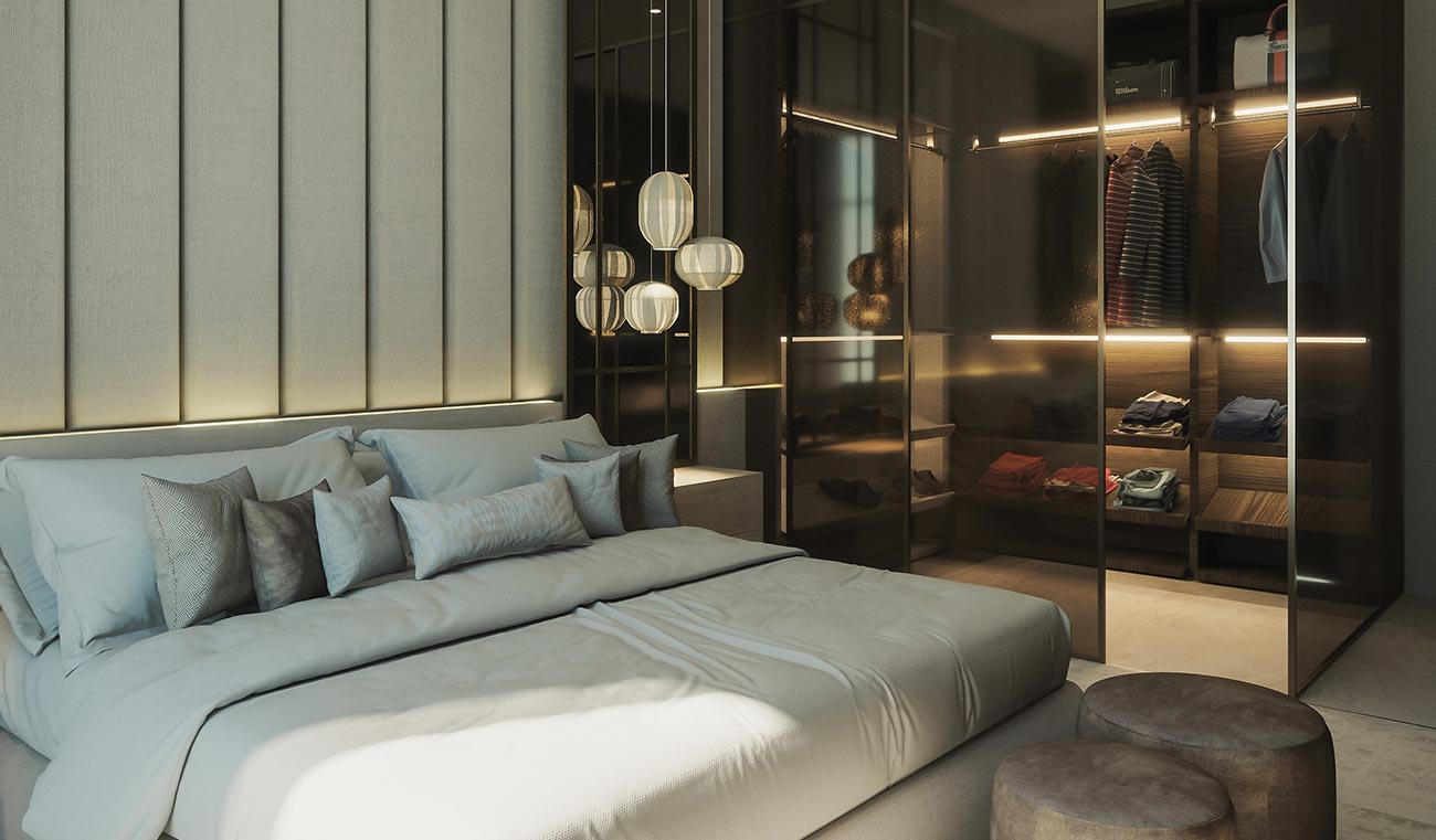 A bedroom with a large bed and glass walls